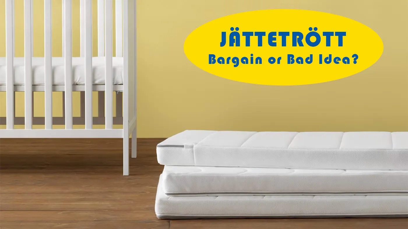 IKEA Cot Mattresses – JÄTTETRÖTT IKEA JÄTTETRÖTT cot mattress – stacked white cot mattresses with a crib
